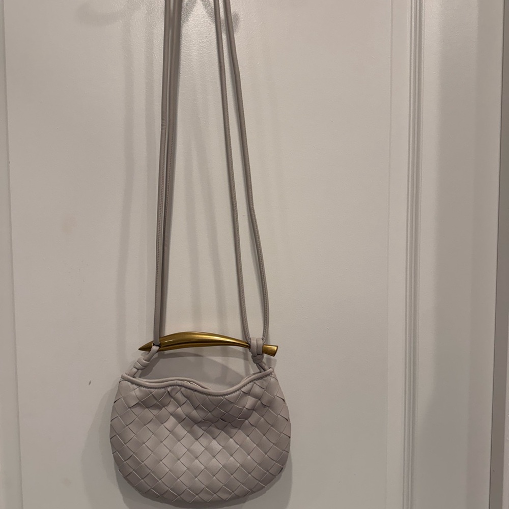 Crossbody bag with gold handle